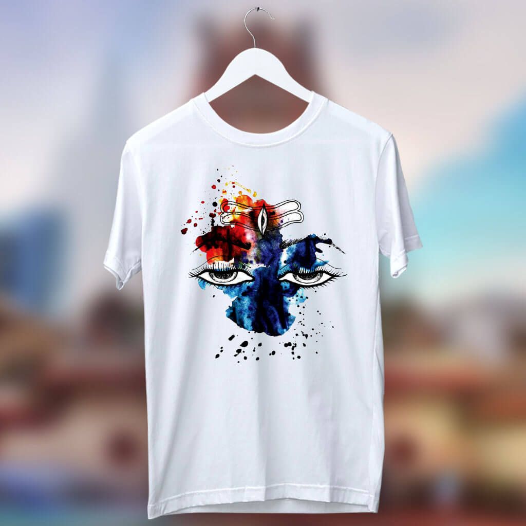 White T-Shirt with an abstract watercolor illustration of Shiva's eyes and third eye (Trinetra) with colorful splatters.
