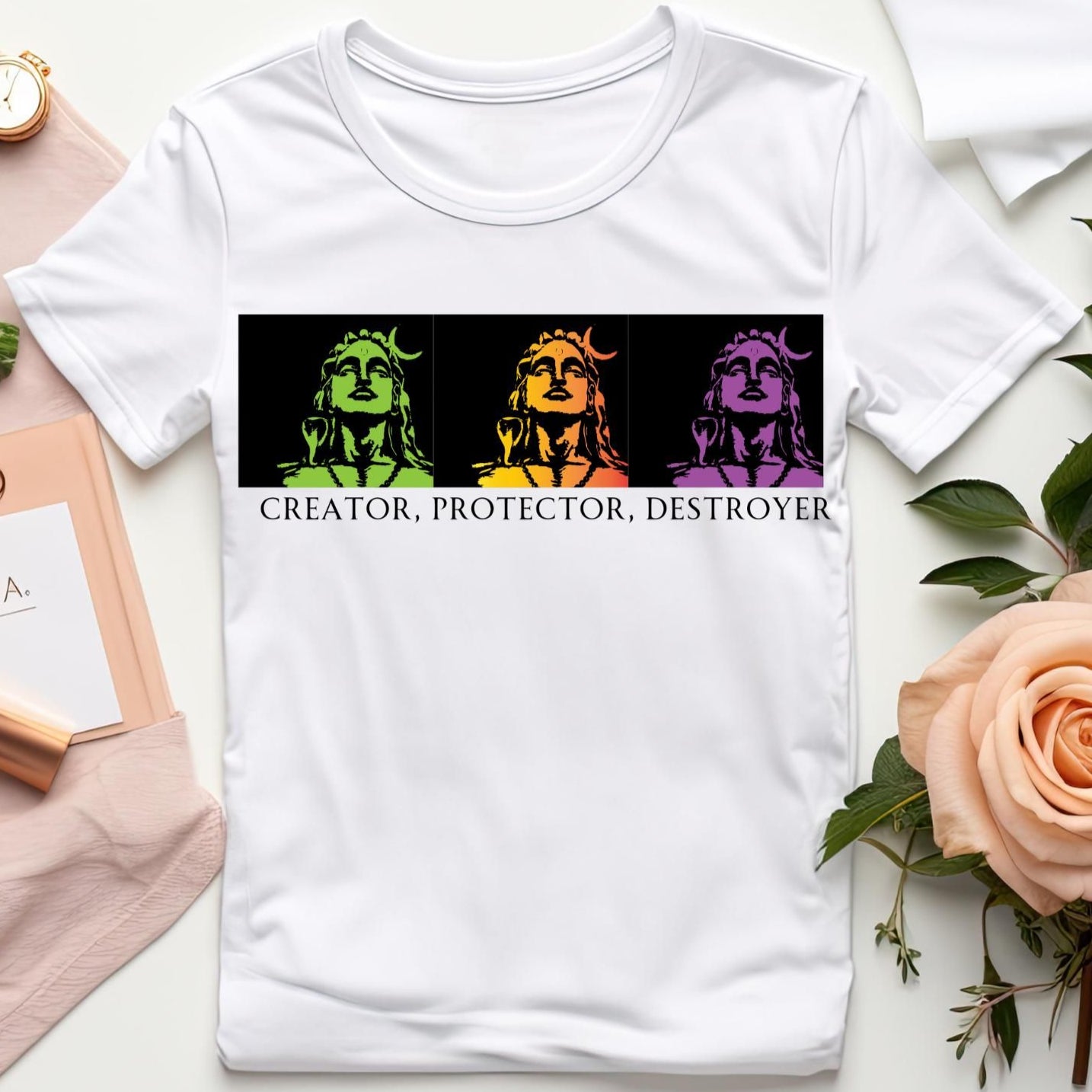 White T-Shirt with three colored silhouettes of Shiva and the phrase "CREATOR, PROTECTOR, DESTROYER" written below.