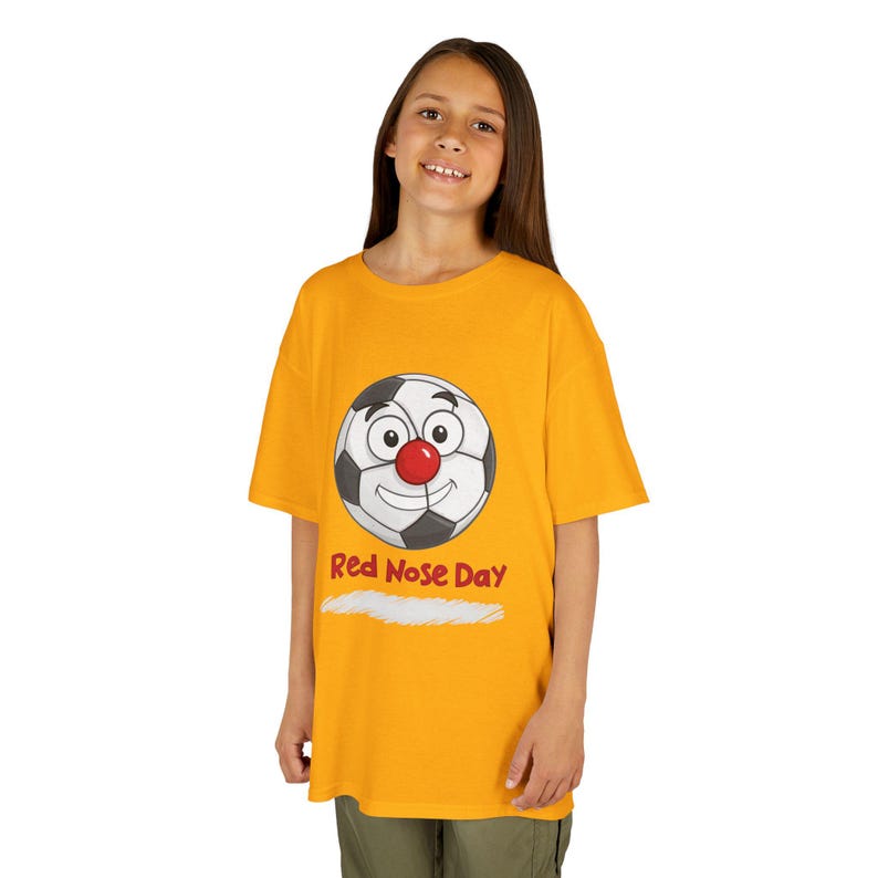 Kids' Light Orange Red Nose Day Soccer Ball Graphic T-shirt.