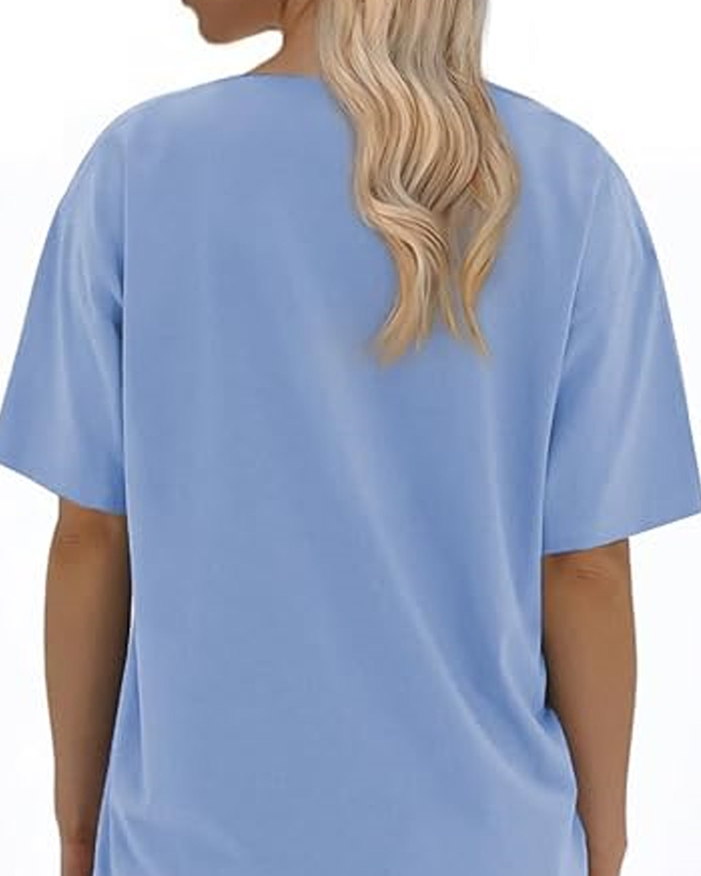 Back view of a person with long blonde hair wearing a light blue oversized t-shirt.
