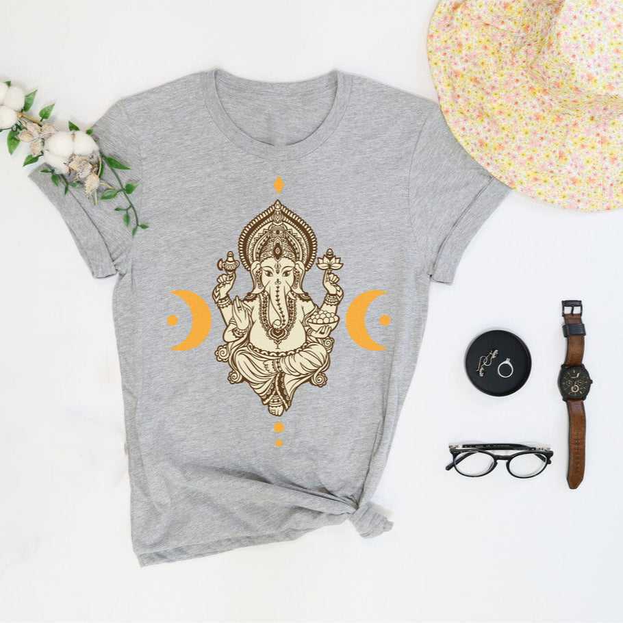 Heather Grey T-Shirt featuring a detailed, golden illustration of Lord Ganesha flanked by crescent moon symbols.