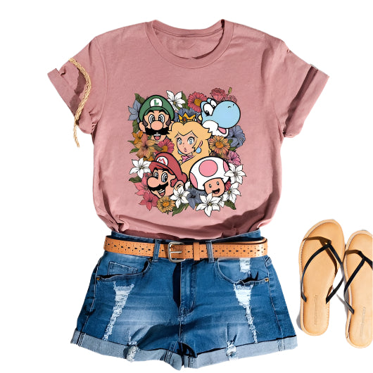Dusty rose t-shirt featuring Mario, Luigi, Princess Peach, Toad, and Yoshi surrounded by colorful retro flowers.
