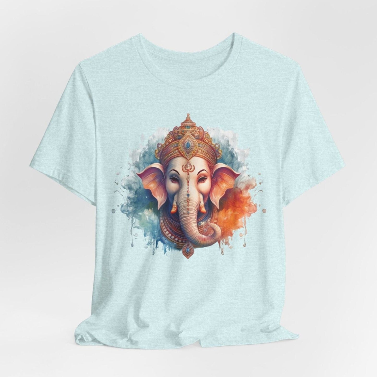A light blue t-shirt featuring a detailed, artistic depiction of Lord Ganesh's face, a divine blessing to wear.