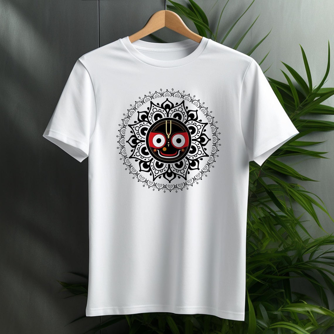 White T-shirt featuring a sacred Jagannath face within a black mandala design, radiating devotion and divine energy.