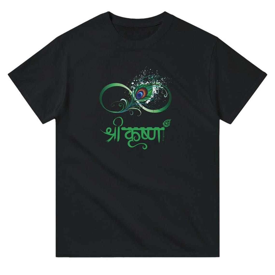 Black t-shirt with a stylized green infinity symbol incorporating a peacock feather eye and the words "Shri Krishna" in Devanagari script below.