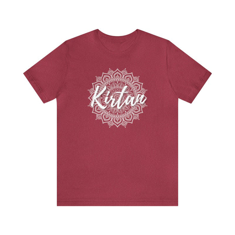 Red t-shirt featuring a white mandala design with "Kirtan" text, perfect for devotional and spiritual gatherings.