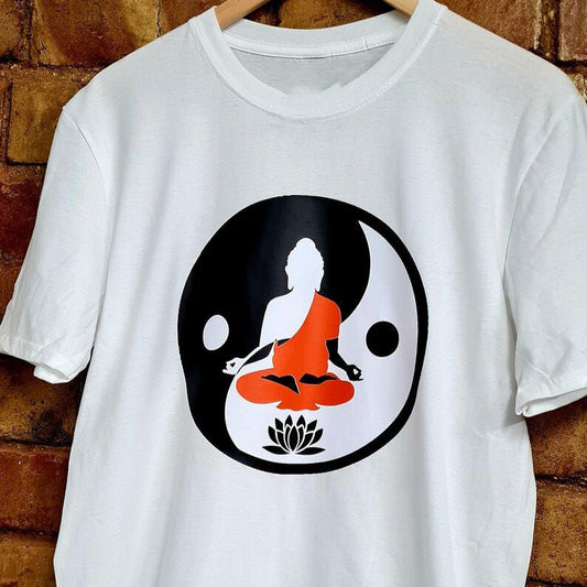 A white t-shirt featuring a Buddha silhouette within a Yin Yang symbol, representing balance and peace on the path.