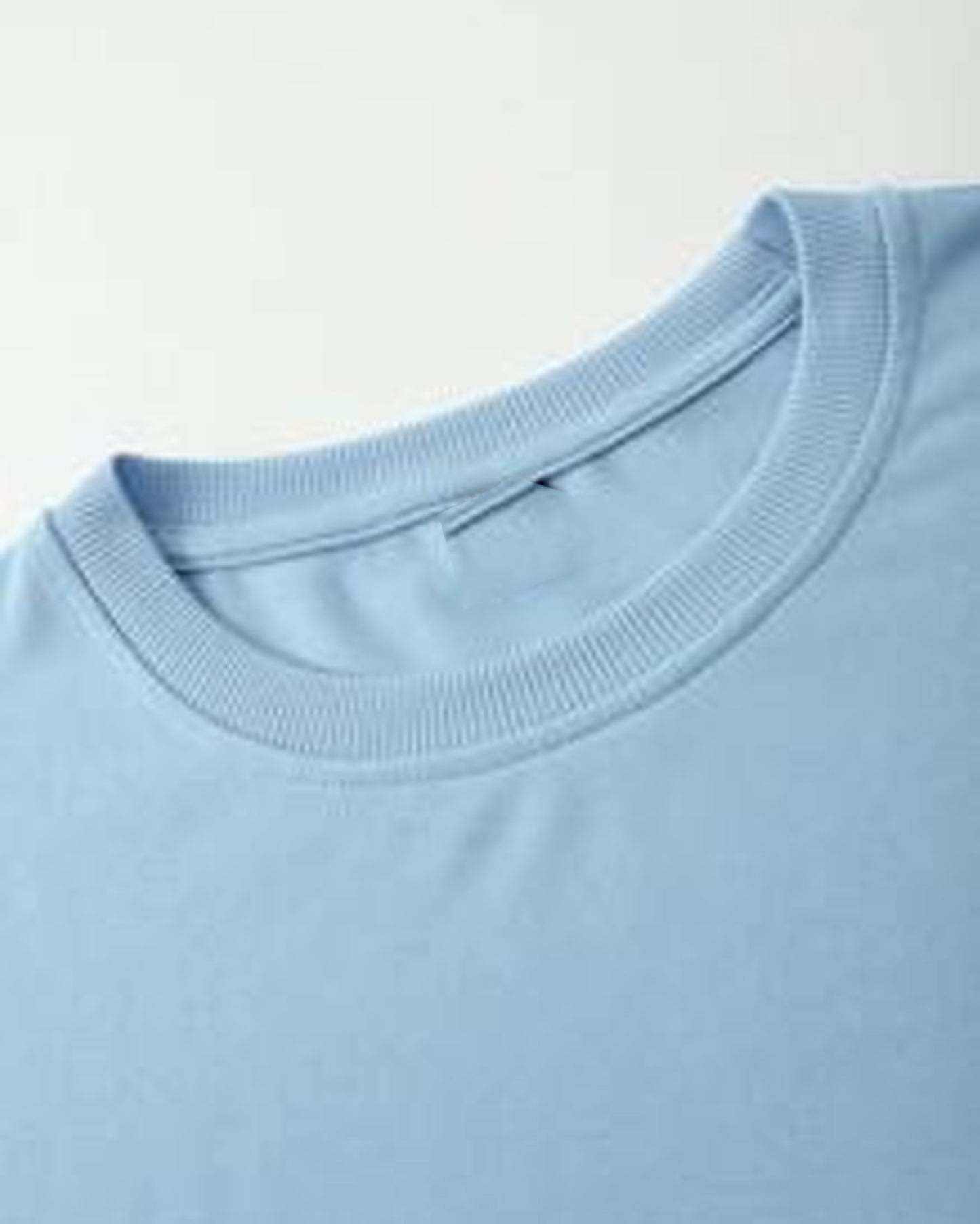 Kitten Pocket T-Shirt Playful Graphic on Light Blue Fabric