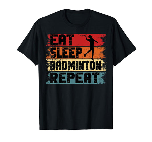 Black short-sleeve T-shirt featuring a retro-style 'Eat Sleep Badminton Repeat' design with bold distressed text, colorful stripes, and a badminton player silhouette. Ideal for badminton lovers and sports enthusiasts.