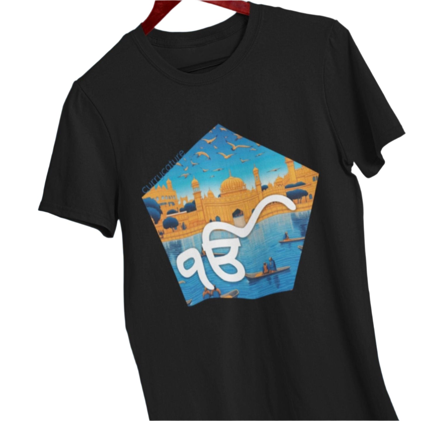 A black t-shirt featuring the Ik Onkar symbol and a stylized cityscape, symbolizing the divine unity and grace found in urban spaces. 