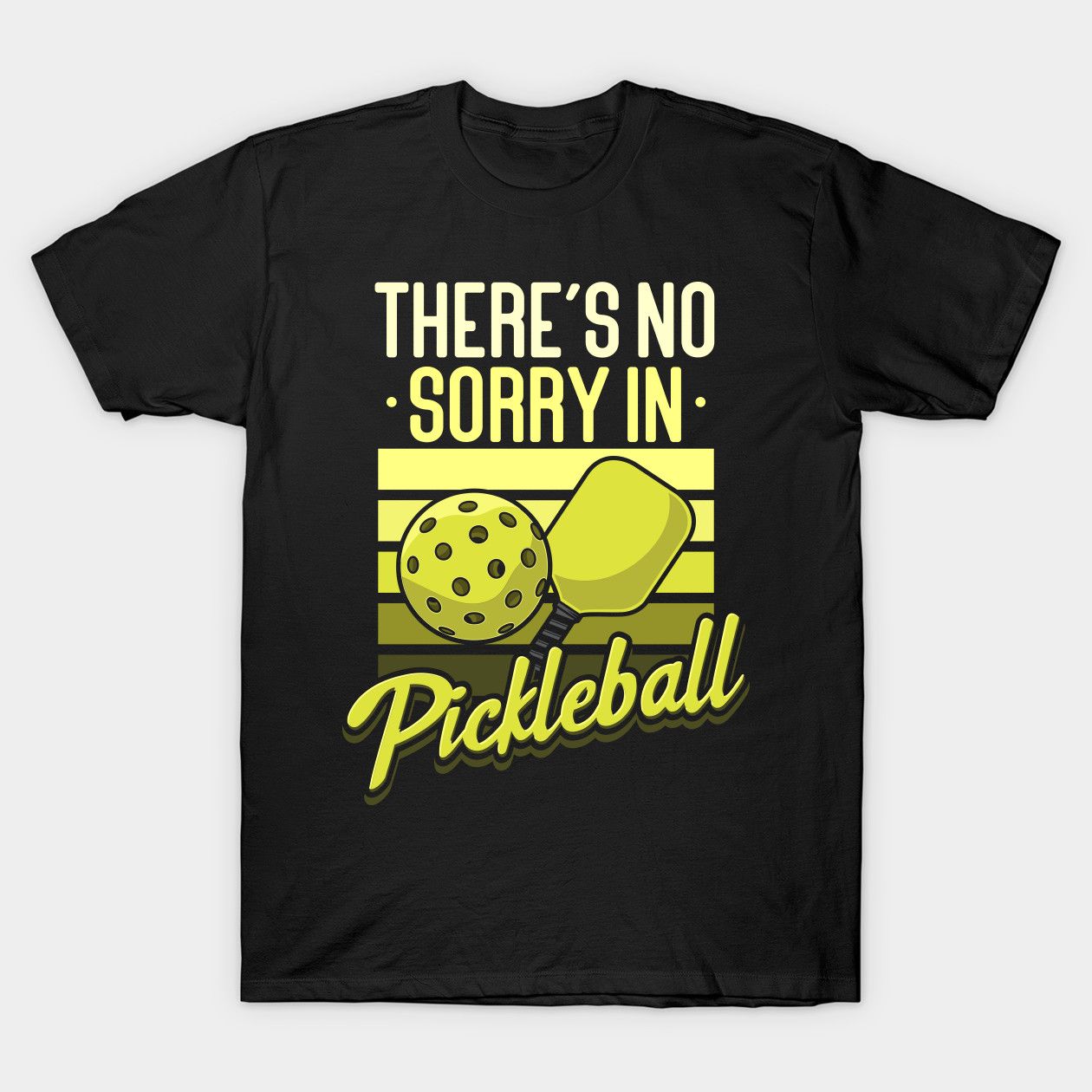 Black t-shirt with "There's no sorry in Pickleball" quote and paddle & ball graphic.