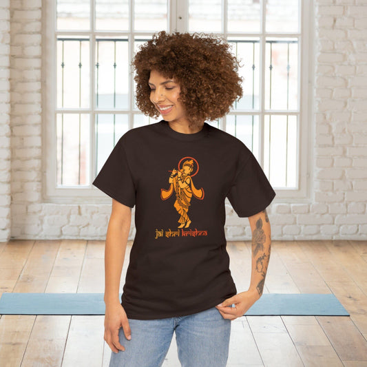 Dark brown t-shirt with an orange ethnic-style illustration of Krishna playing the flute and "Jai Shri Krishna" written in Morden Devanagari script below.