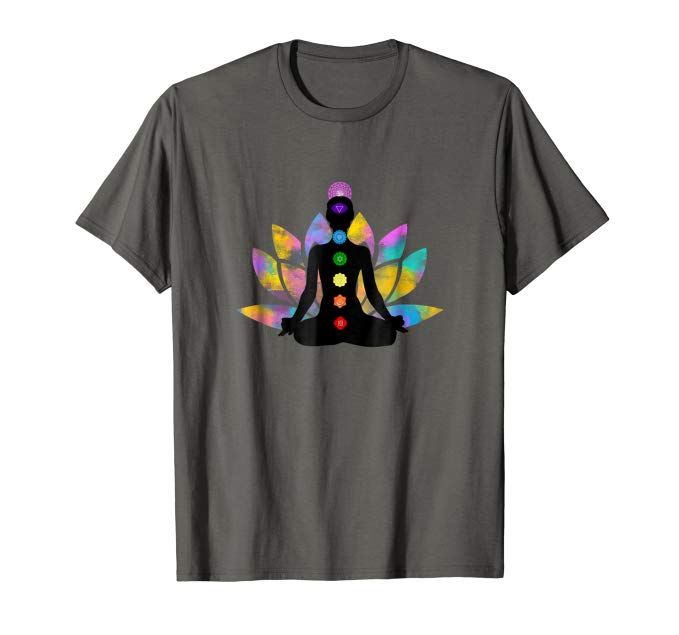 Dark grey T-Shirt with a silhouette graphic of a person meditating in a lotus pose, displaying the seven chakra colors along their body, set against a colorful lotus flower background.