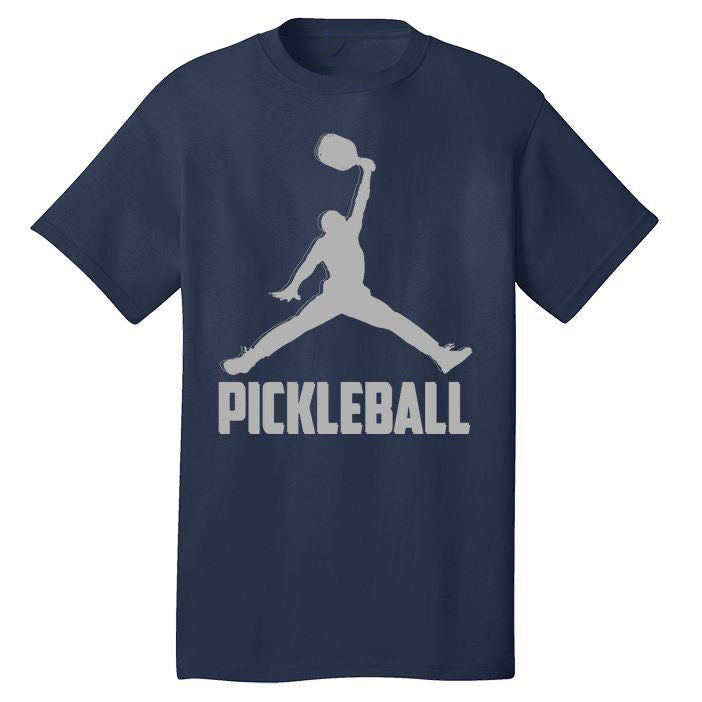 Navy t-shirt with a pickleball player silhouette in a jumpman pose and "Pickleball" text.