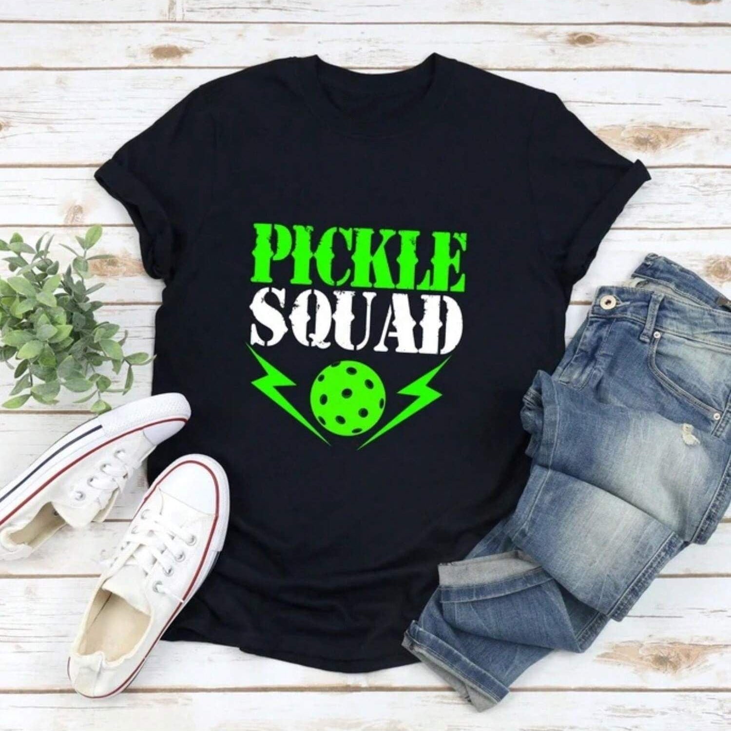 Black t-shirt with "Pickle Squad" text and pickleball graphic.