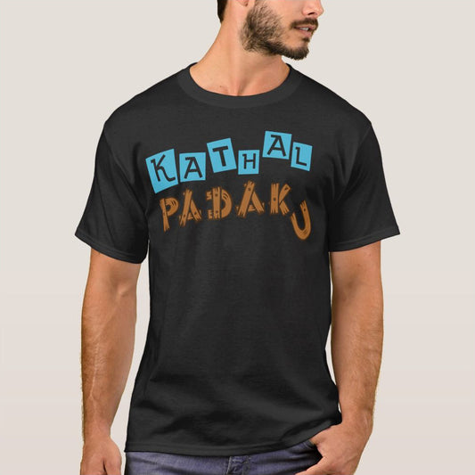 Black t-shirt with the Telugu phrase 'Kathaal Padaku' printed in blue and brown letters.  Humorous design telling someone not to create stories on a comfortable t-shirt.