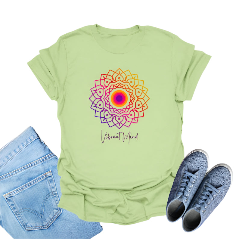 Apple Green t-shirt displays a colorful gradient mandala graphic and the text "Vibrant Mind" in cursive.