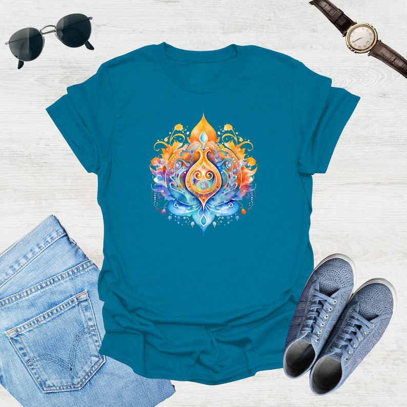 Aquatic blue t-shirt showcases a colorful, psychedelic lotus flower graphic with swirling orange, blue, and yellow details.