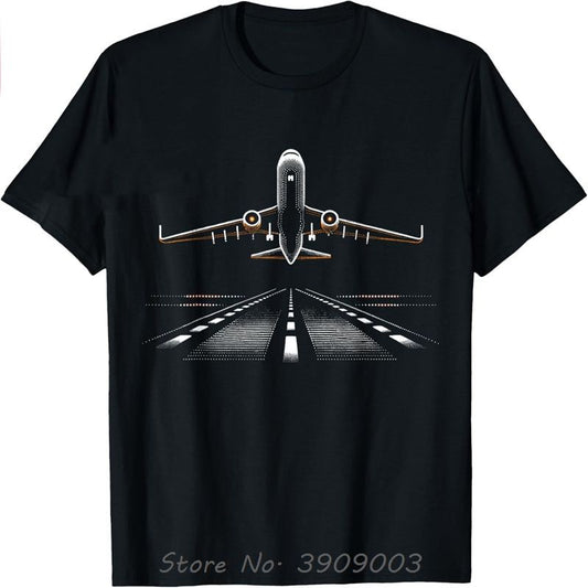 Black t-shirt featuring a stylized airplane taking off from a runway, viewed from behind.