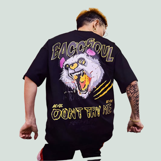 Dark-colored oversize t-shirt with "Baccsoul" text, a roaring bear-like face graphic, and "Don't Try Me" text on the back.