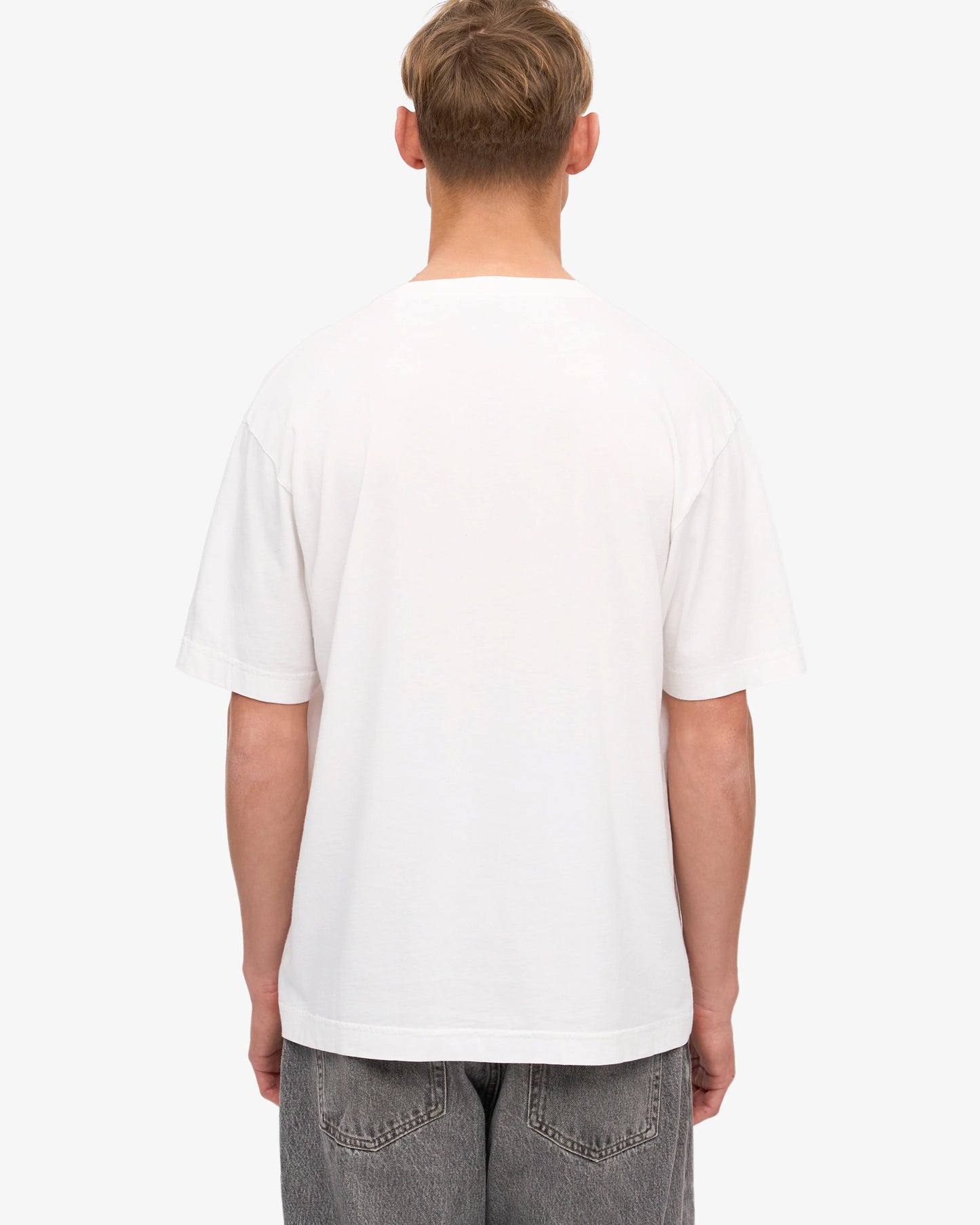 Back Side View of White Oversize T-Shirt & Grey Jeans