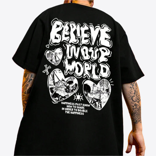 Dark-colored oversize t-shirt with "Believe In Our World" text, heart-shaped graphics, and a quote on the back.