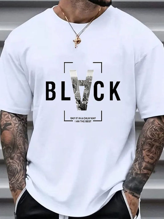 Light-colored oversize t-shirt with "Black" text, a cityscape graphic within the letter "V", and a short quote.