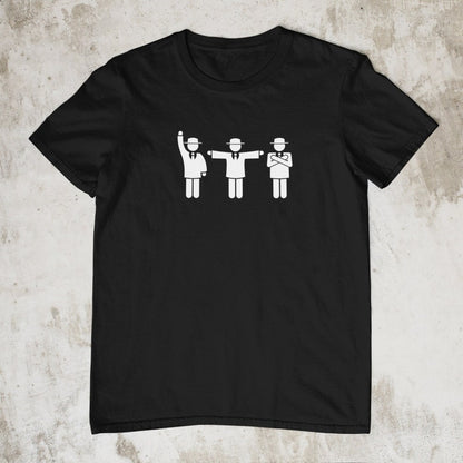 Black t-shirt featuring three black pictogram figures in suits and hats, depicting cricket umpires with different signals.