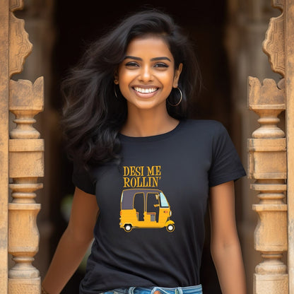 A smiling woman models a black t-shirt with a yellow auto rickshaw graphic and the text "Desi Me Rollin'".