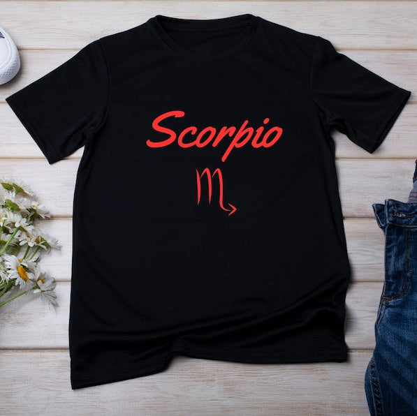Black t-shirt features the word "Scorpio" and its astrological symbol in red.