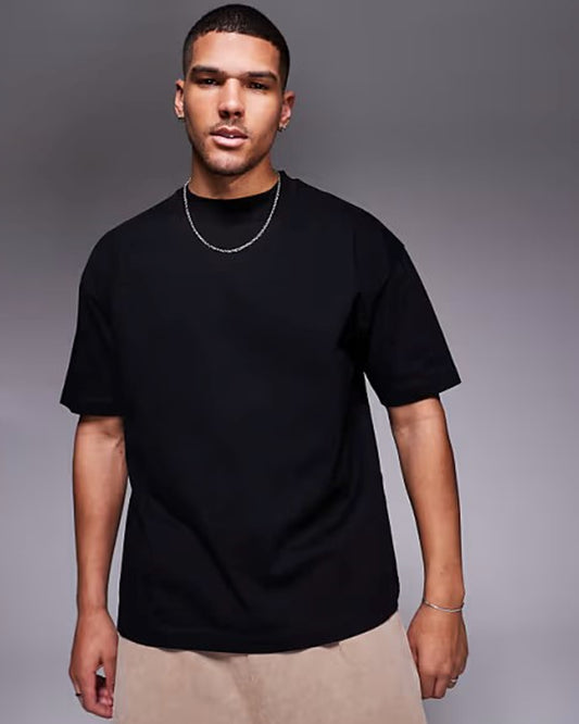 A man in a black t-shirt and light-Elegance_for_the_Modern_Man front side