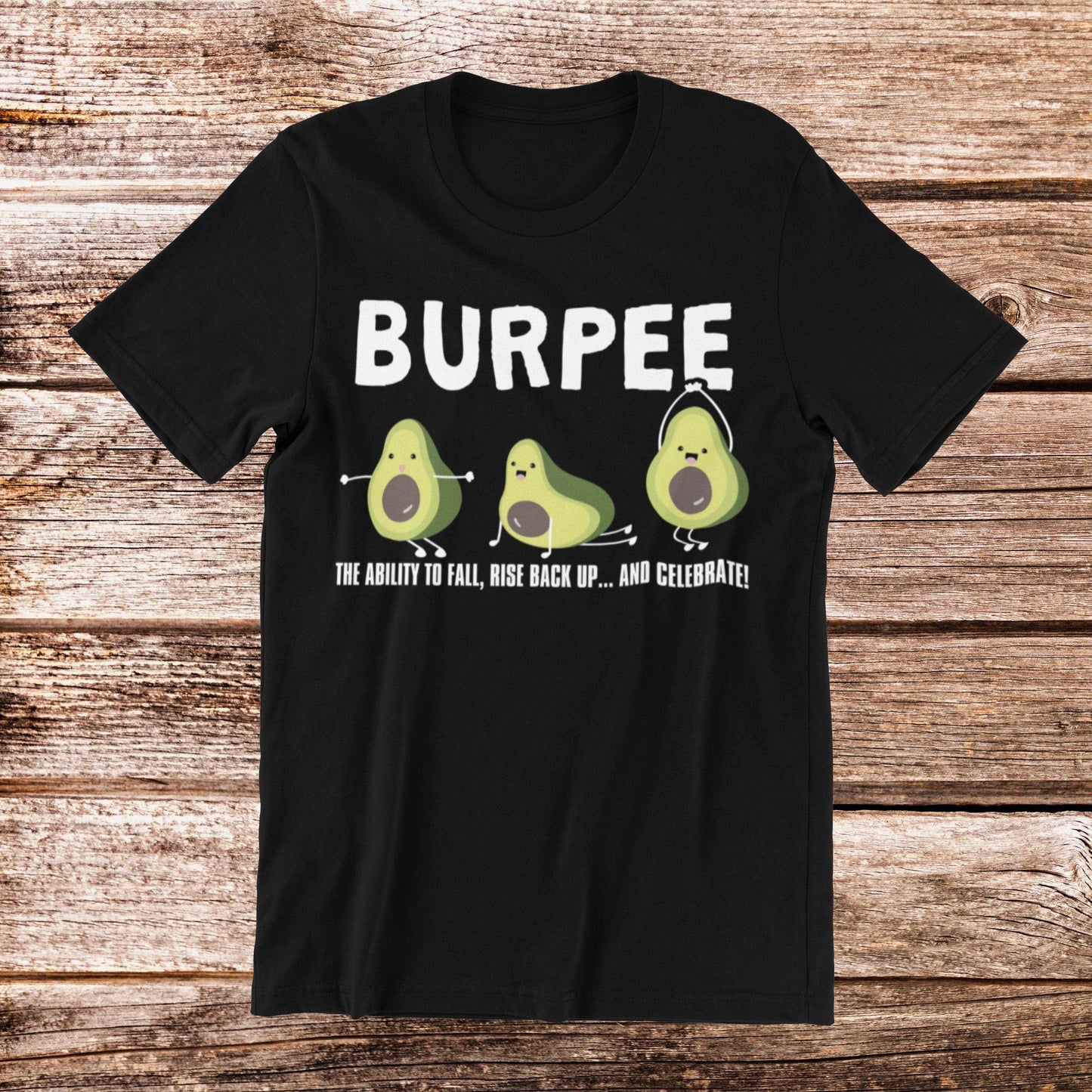 Black t-shirt with "BURPEE" text, avocado cartoon, and "THE ABILITY TO FALL, RISE BACK UP...AND CELEBRATE" quote.