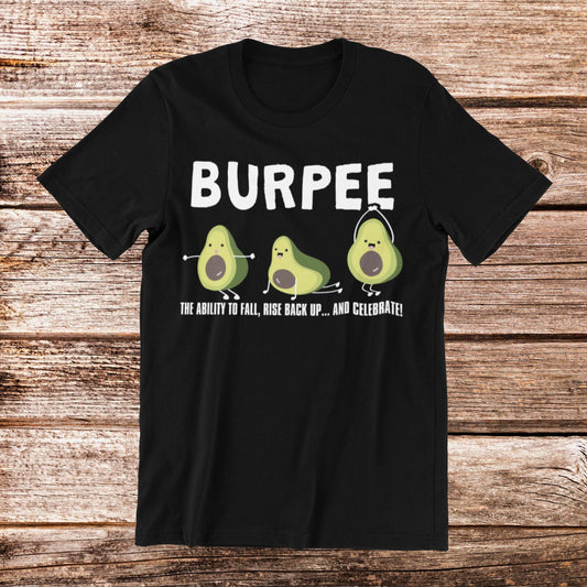 Black t-shirt with "BURPEE" text, avocado cartoon, and "THE ABILITY TO FALL, RISE BACK UP...AND CELEBRATE" quote.