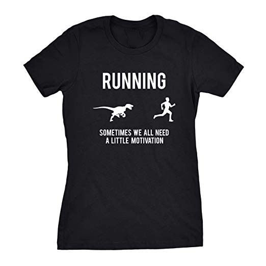Black t-shirt with "RUNNING" text, dinosaur chasing jogger, "SOMETIMES WE ALL NEED A LITTLE MOTIVATION" text.