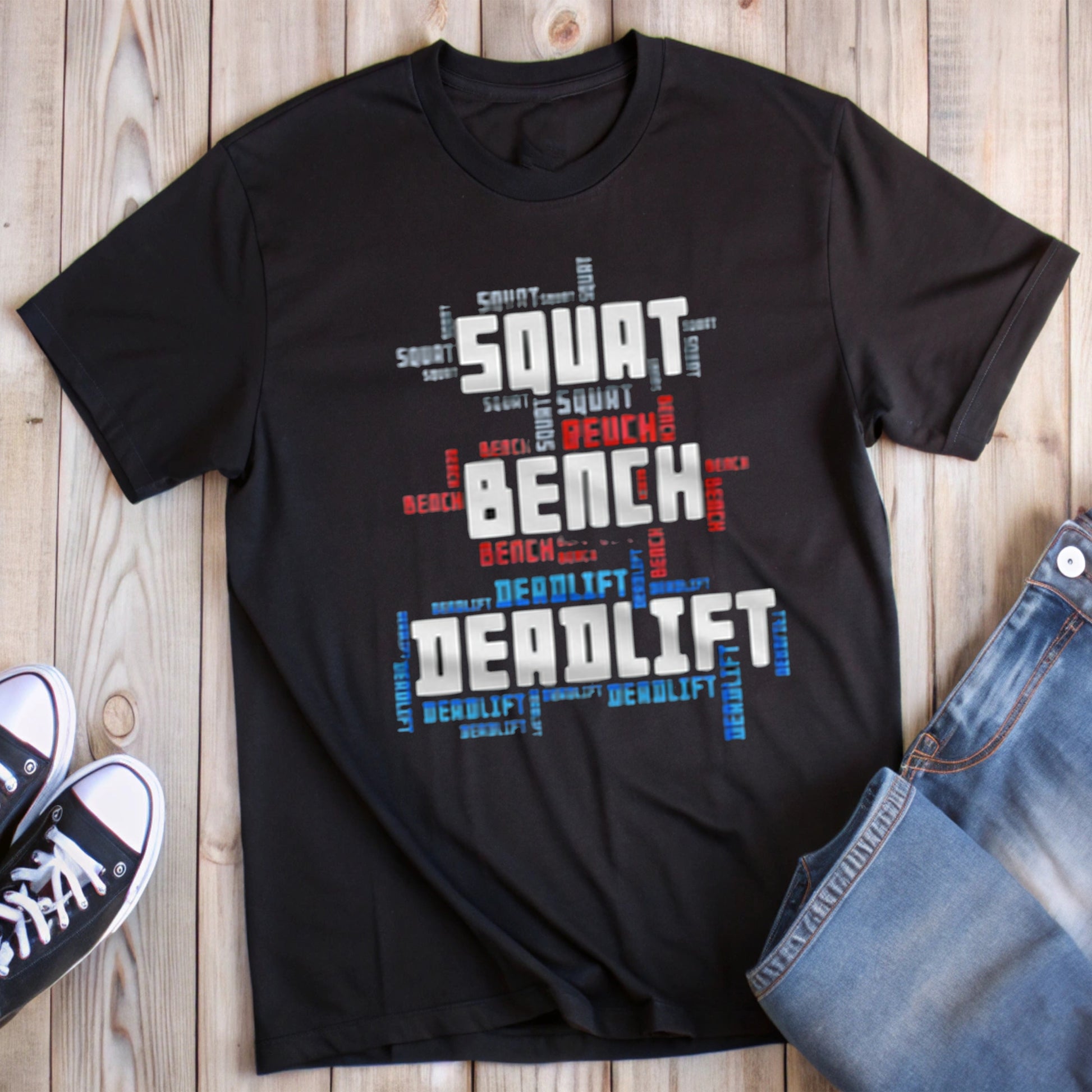 Black t-shirt with "SQUAT BENCH DEADLIFT" word art design.
