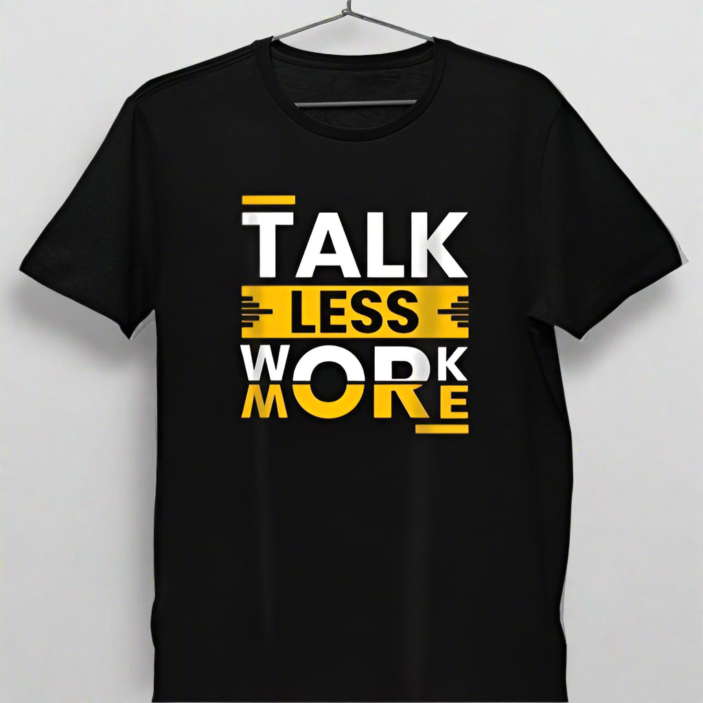 Black t-shirt with "TALK LESS WORK MORE" graphic, held by hand.