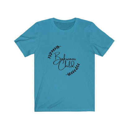 Blue t-shirt featuring the text "Bakwaas Child" in a stylish font, accompanied by leaf graphics.