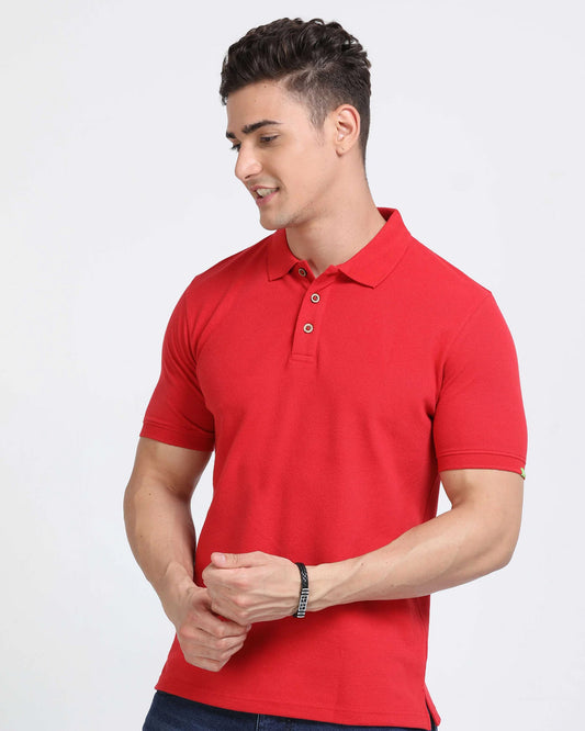 Men wearing a bold red polo t-shirt with collar and short sleeves