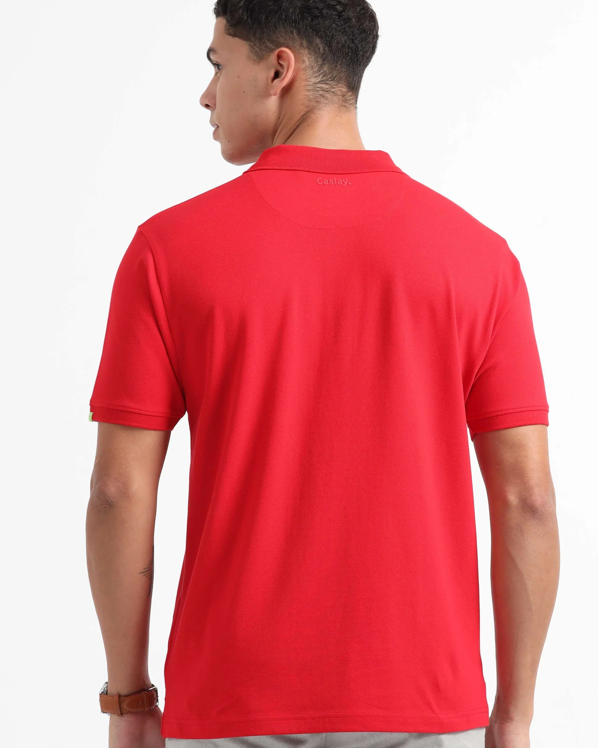 Casual_Look_Men_in_Bright_Red_Polo_T-shirt_back_side_view