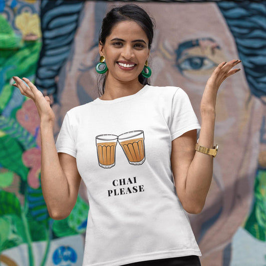 White t-shirt with two glasses of chai toasting and "Chai Please" text. A cheerful design for chai enthusiasts.