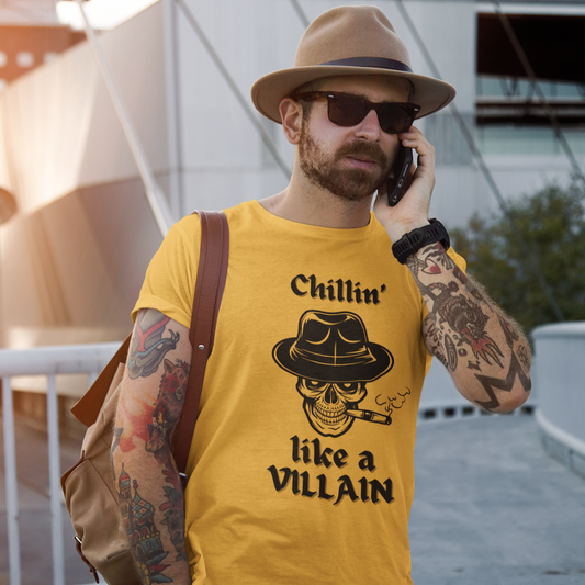 Yellow t-shirt with "Chillin' Like a Villain" text and a skull wearing a fedora graphic.
