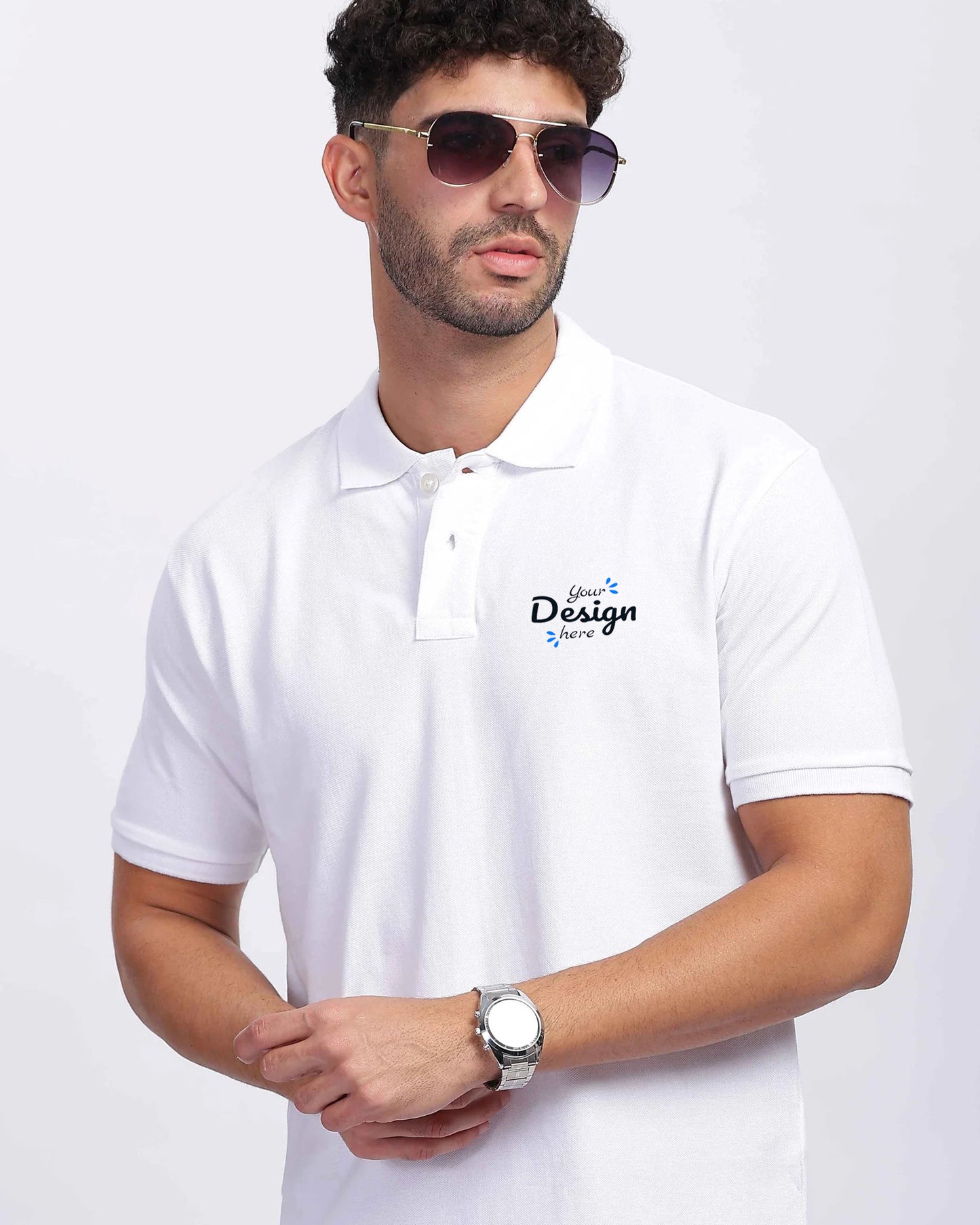 Men in white polo t-shirt featuring a custom design on the left chest