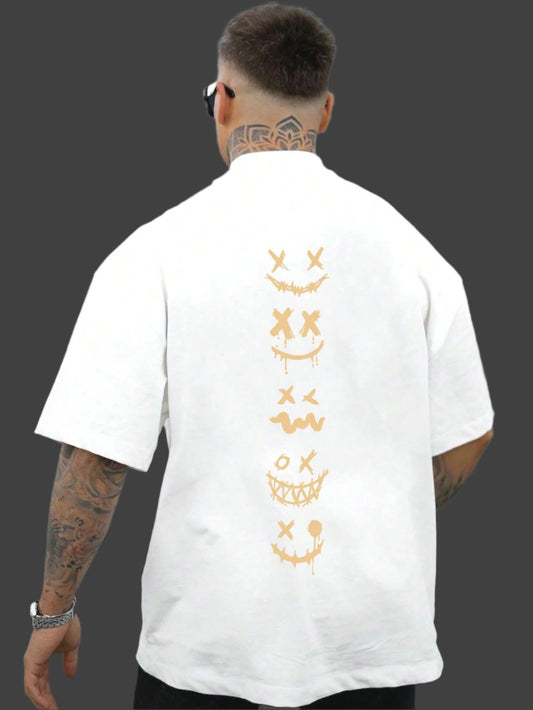 White oversize t-shirt with a vertical line of light-colored emoticon-style faces on the back.