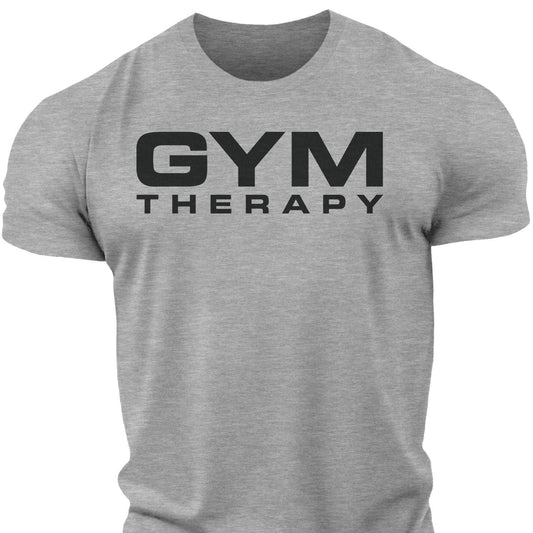 Gray t-shirt with "GYM THERAPY" text on muscular torso.