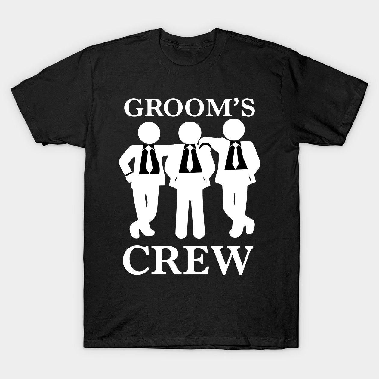 Black cotton t-shirt with white text "GROOM'S" above three stick figures in suits and ties, and "CREW" below.