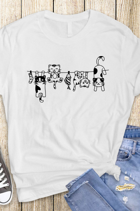 "Hanging Cats" t-shirt features a distinctive, high-quality print on premium fabric, showcasing our commitment to exceptional design and material excellence.