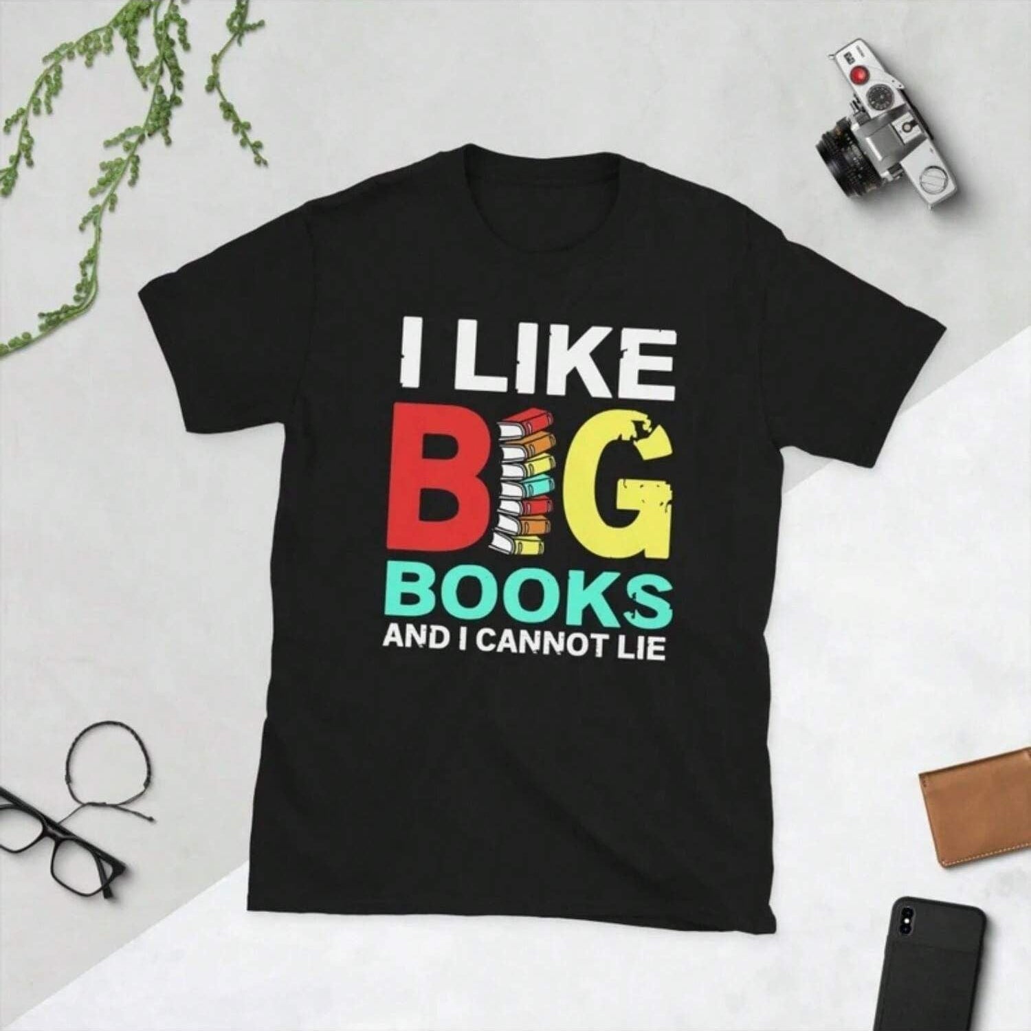 Black t-shirt with "I Like Big Books And I Cannot Lie" in bold, colorful letters.  A playful statement piece for avid readers and book enthusiasts.