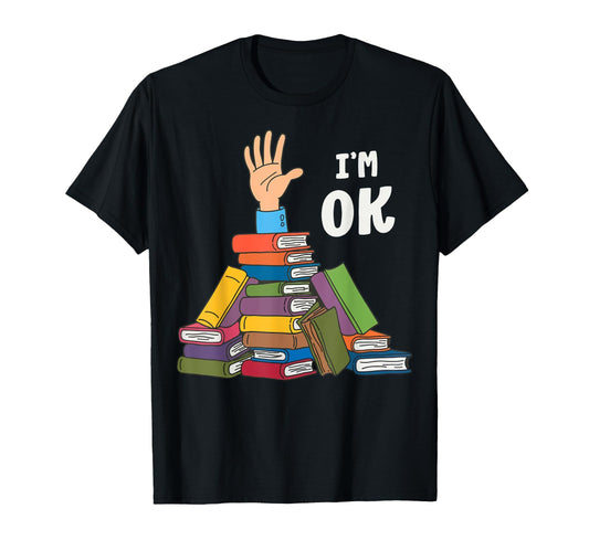 Black t-shirt with a hand sticking out of a stack of books and "I'm Ok" text.  A funny and relatable design for book lovers.