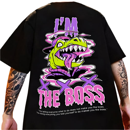 Dark-colored oversize t-shirt with a cartoon crocodile graphic, "I'm The Boss" text, and a quote at the bottom on the back.