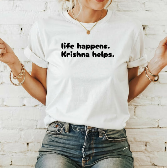 White T-Shirt featuring the uplifting text "life happens. Krishna helps." in white lettering.